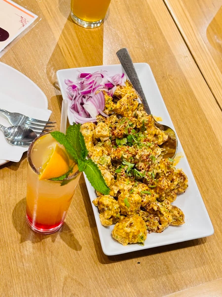 Clay Pot chaat starter with a drink